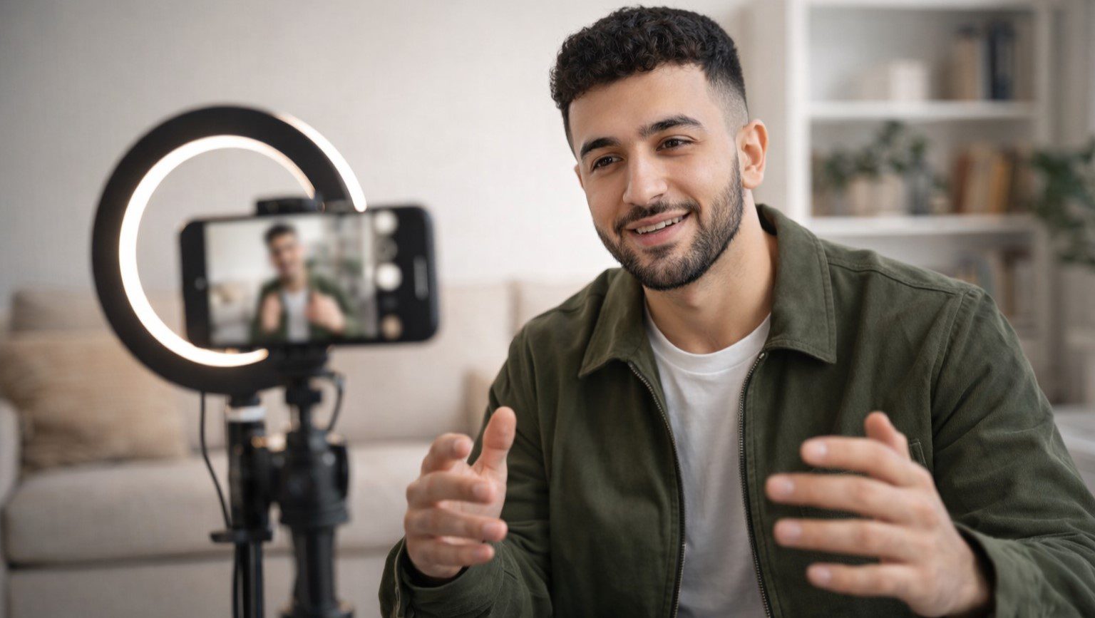 Male content creator filming short-form video with smartphone