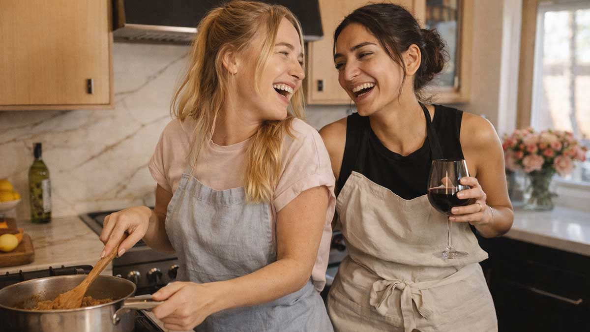 Alix Traeger and her partner Zorna smiling together during a travel vlog