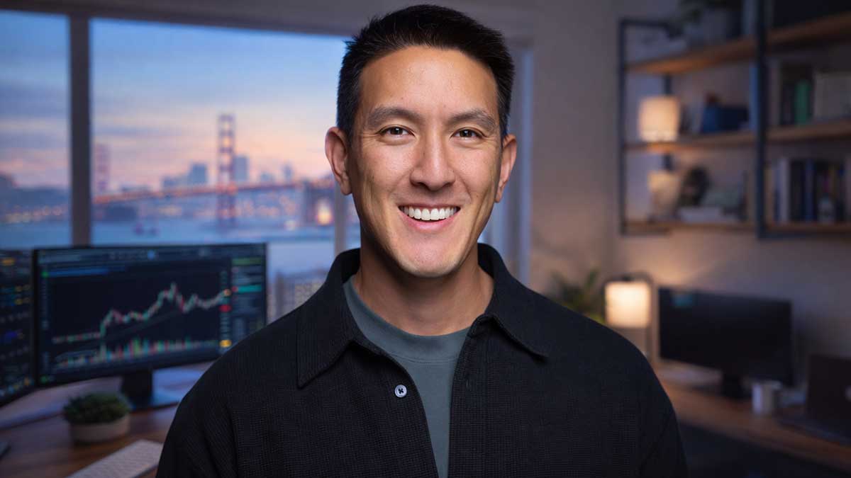A professional portrait of Humphrey Yang smiling in a San Francisco home office.