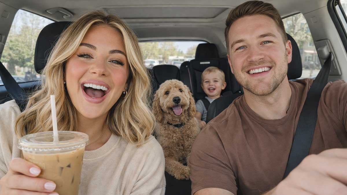 Candid photo of Courtney Cahoon with her husband Jake, son Hudson, and their dogs