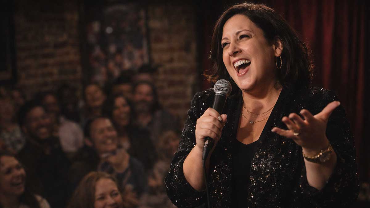 Robyn Schall performing stand-up comedy live on stage